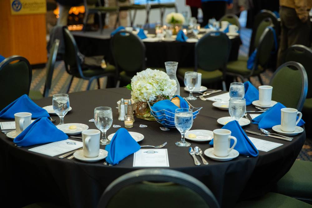 A photo of the table setup at the Reunion Dinner.